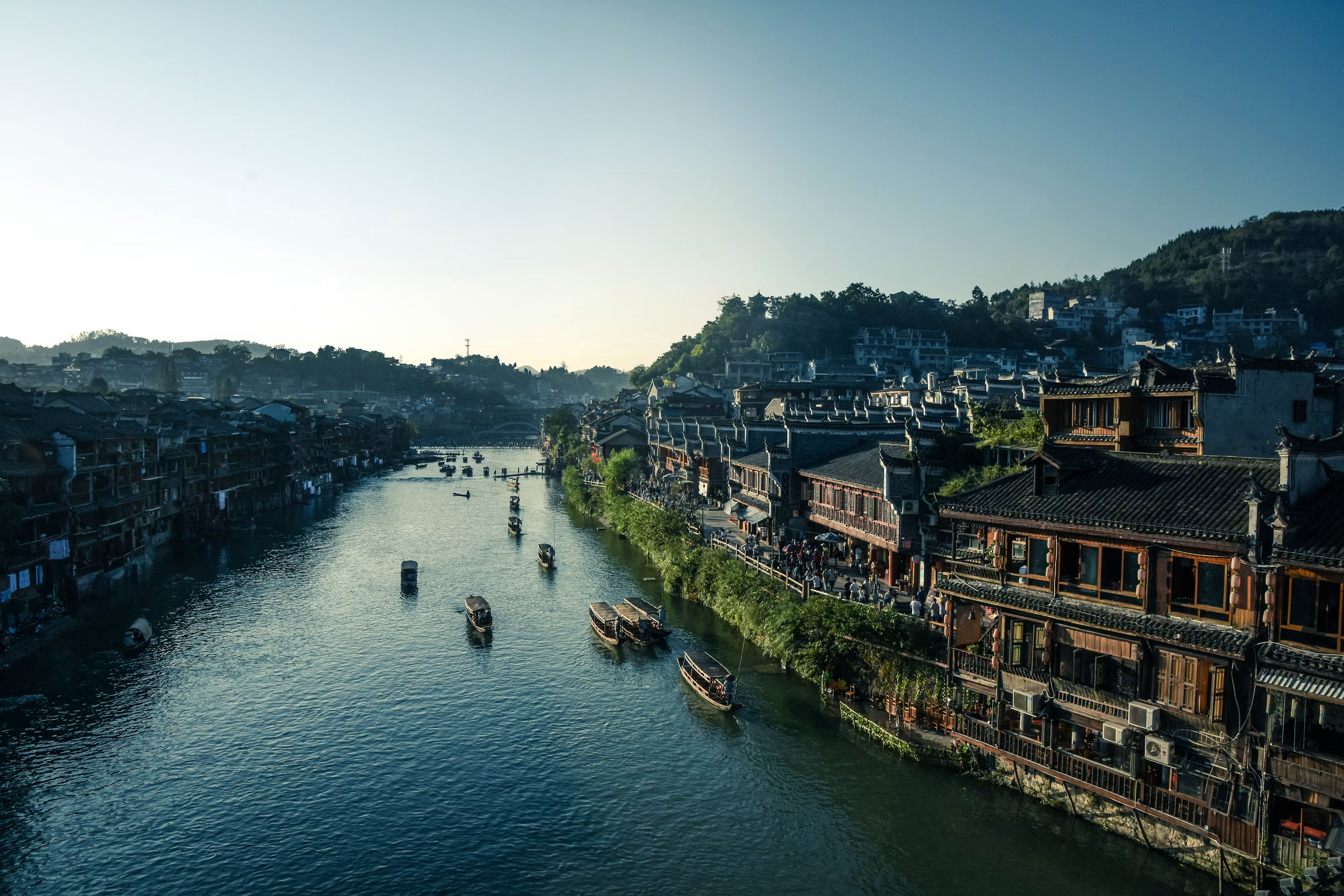 A river town in China at blue hour