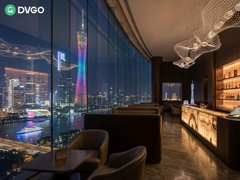 Guangzhou skyline view from upscale rooftop bar with Canton Tower at night