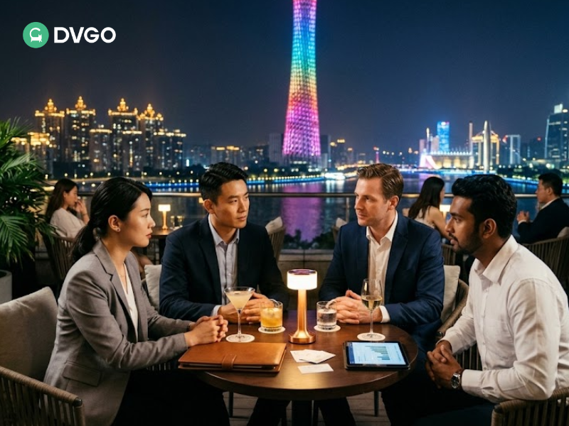 Small group networking meeting with drinks in a relaxed rooftop venue during Canton Fair 2026